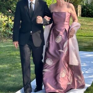 Gorgeous silk gown with individual hand picked Flower appliqué .    Silk tulle w